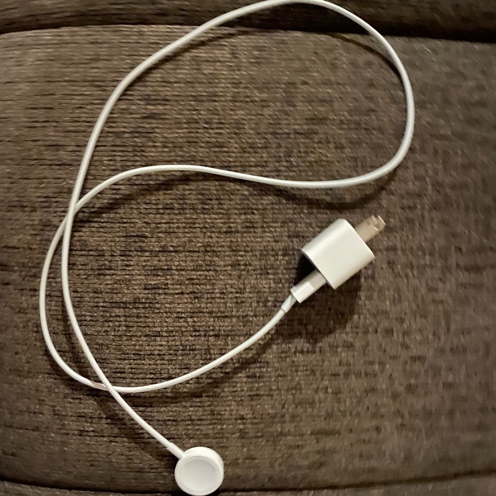 Apple Watch charger with wall block. Works great. For Apple Watch SE or older.